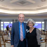 Norman and Anita Christopher standing together and posing for camera